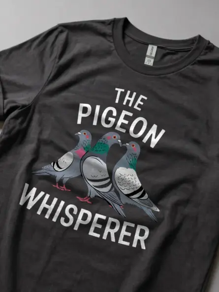 Dark heather pigeon whisperer tee – wild feral pigeon shirt, animal pun t-shirt