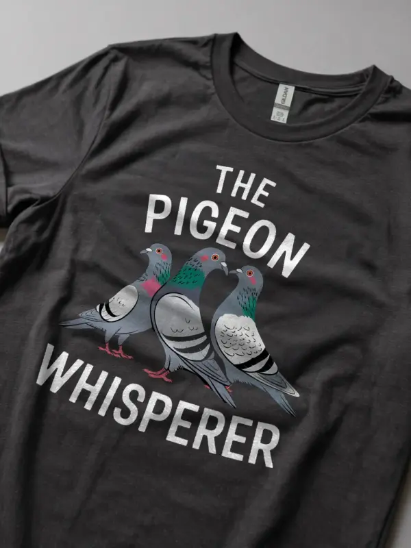 Dark heather pigeon whisperer tee – wild feral pigeon shirt, animal pun t-shirt