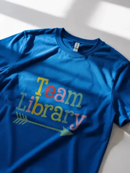 Royal blue library team shirt – colorful book lover shirt