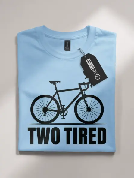 light blue flatlay front view two tired funny cycling pun t-shirt