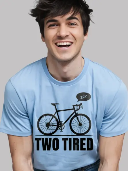 light blue lifestyle image two tired funny cycling pun t-shirt
