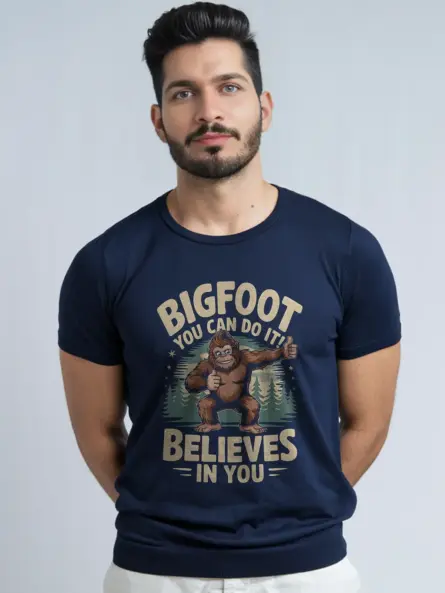 File: navy-side-bigfoot-motivational-t-shirt.webp Navy Bigfoot motivational t-shirt woodland inspiration