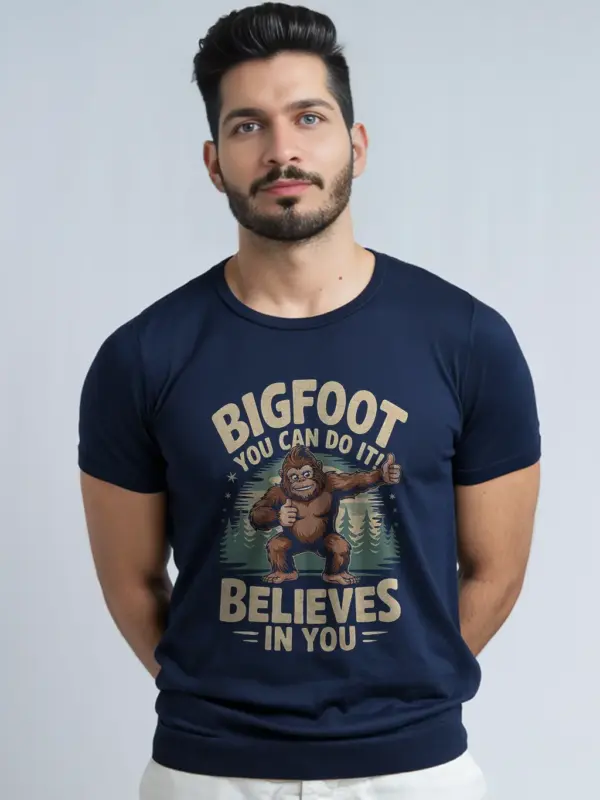 File: navy-side-bigfoot-motivational-t-shirt.webp Navy Bigfoot motivational t-shirt woodland inspiration