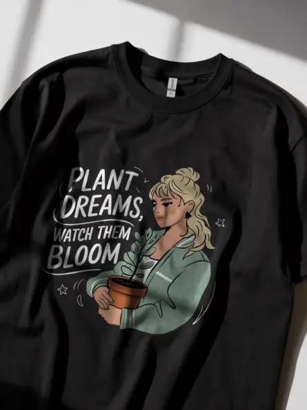 Plant dreams watch them bloom shirt in black – botanical garden tee for women
