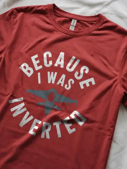 Red lifestyle — inverted jet tee styled for casual streetwear and gift giving