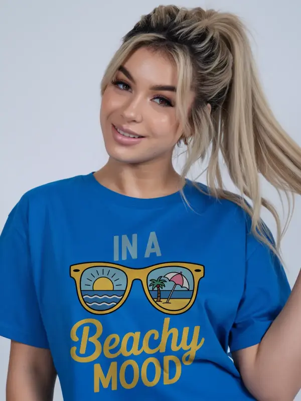 Royal blue lifestyle image of beachy mood t-shirt – sunny day shirt with ocean scene sunglasses print