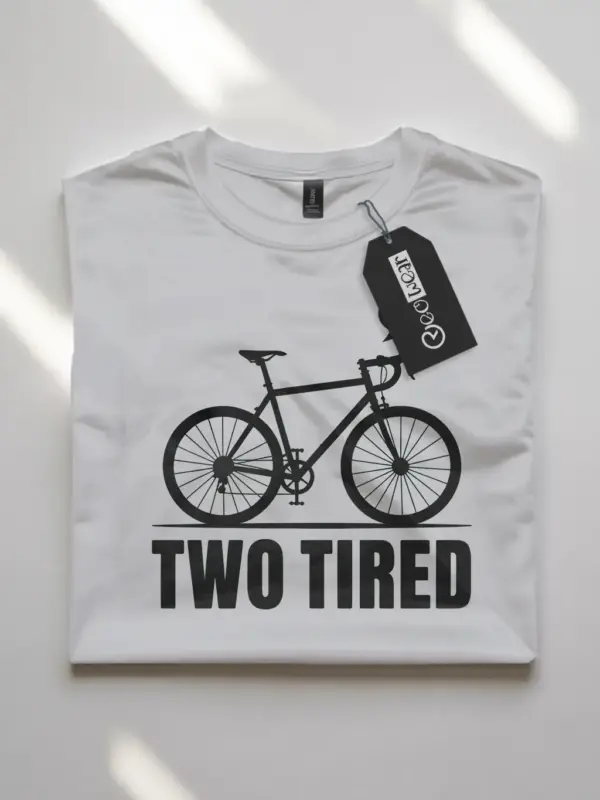white flatlay front view two tired funny cycling pun t-shirt