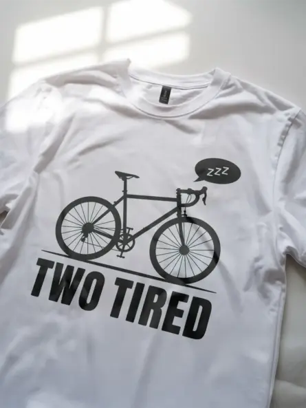 white lifestyle image two tired funny cycling pun t-shirt
