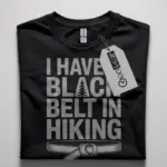 black belt in hiking shirt