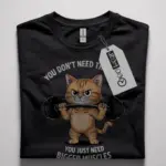 Front view of black shirt with cat lifting weights design, funny cat gym t-shirt