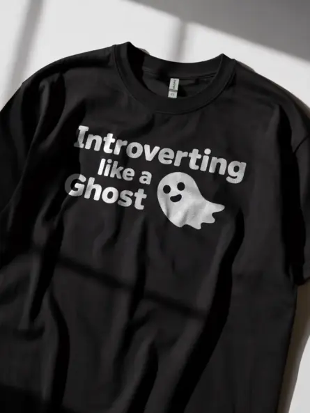 black lifestyle shot introverting like a ghost t-shirt mental health apparel