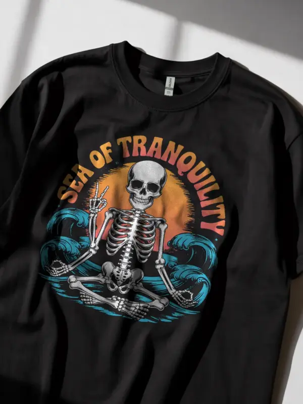 Black sea of tranquility t-shirt lifestyle image – psychedelic surf skeleton tee