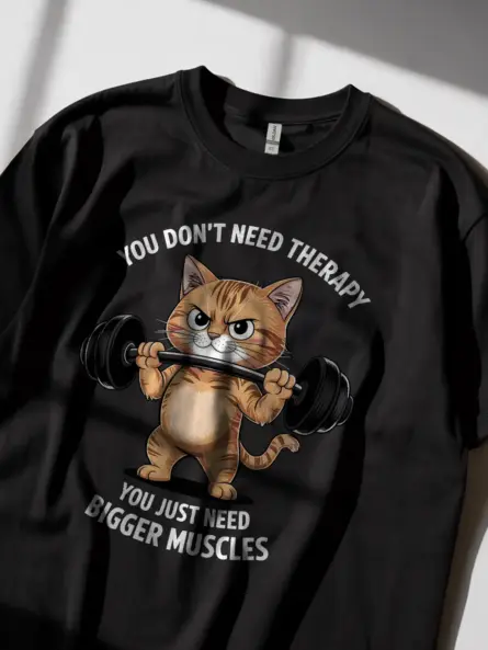 Lifestyle photo of black shirt worn in gym, funny cat gym t-shirt design