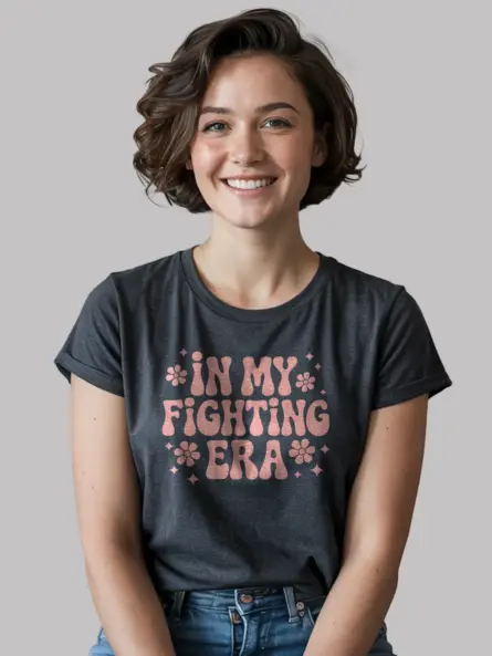 dark heather front – In My Fighting Era Shirt pink ribbon 70s design