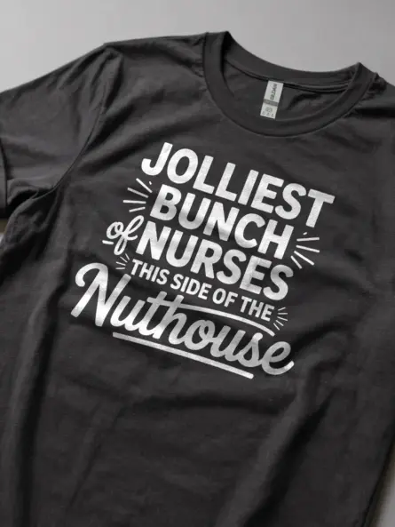 dark heather jolliest bunch of nurses shirt lifestyle shot with coffee