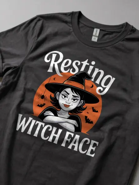 dark heather lifestyle shot resting witch face halloween t-shirt for grunge witch fans