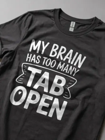 Lifestyle image wearing dark heather my brain has too many tabs open t-shirt