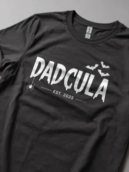 Casual photo in dark heather dadcula halloween shirt for dad and baby