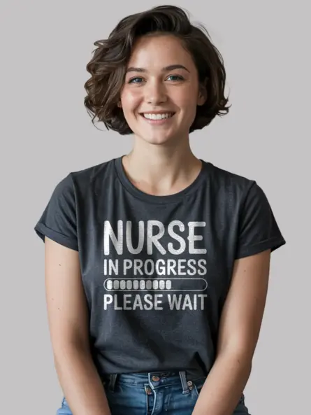 Lifestyle image of dark heather nurse in progress t-shirt in casual setting