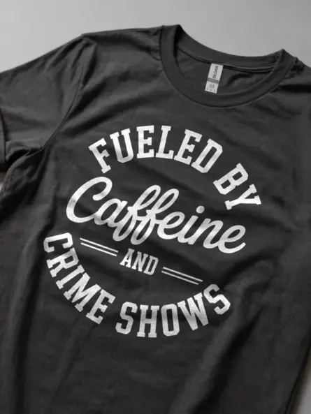 dark heather Lifestyle shot of dark heather funny crime binge watching tee