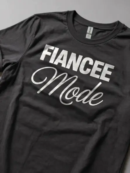 dark heather Lifestyle shot dark heather future bride tee with fiancee mode text