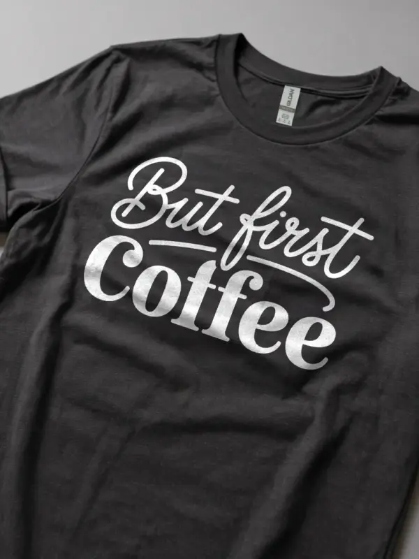 Lifestyle image of dark heather but first coffee shirt for office workers