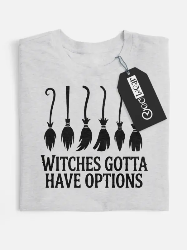 grey flatlay Witty Funny Witch Broomstick T-Shirt for Halloween Vibes grey flatlay witches gotta have options funny witch broomstick t-shirt front view