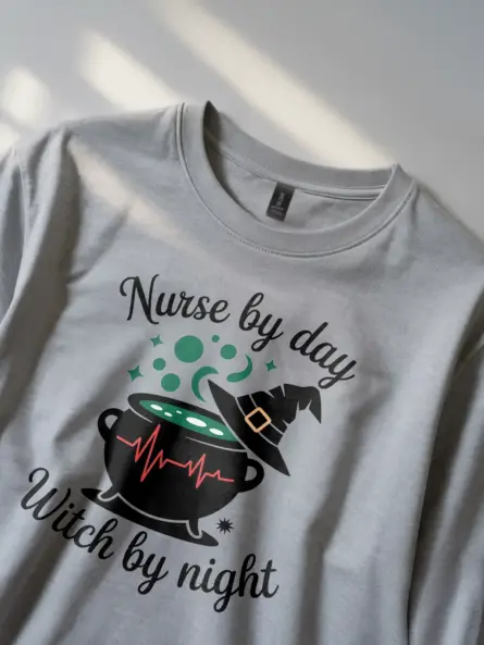 grey lifestyle shot nurse by day witch by night t-shirt funny spooky apparel