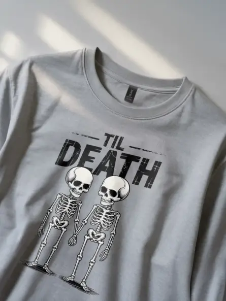 close-up – distressed text and skeleton design on grey gothic skeleton couple t-shirt