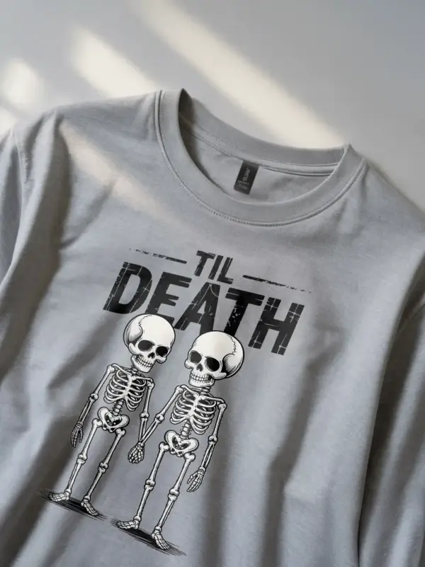 close-up – distressed text and skeleton design on grey gothic skeleton couple t-shirt