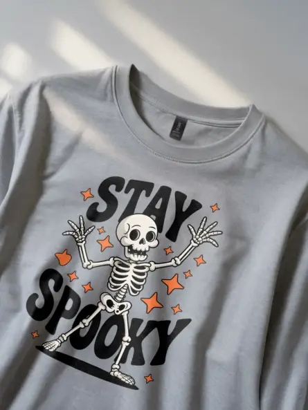 lifestyle – grey retro dancing skeleton Halloween shirt worn at fall event