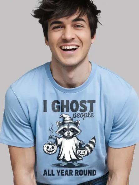 Light Blue close-up – raccoon in ghost costume shirt with Halloween bucket light blue