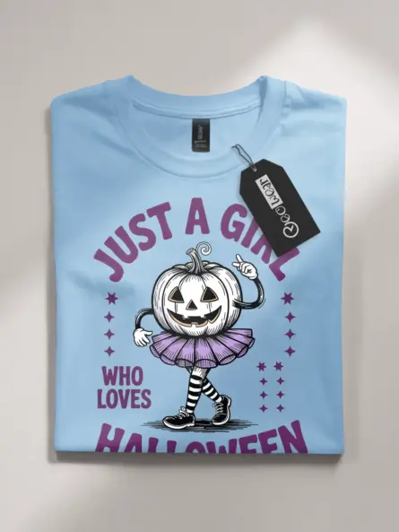 light blue flatlay front view – Just a Girl phrase cute pumpkin girl Halloween t-shirt