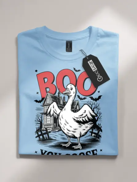 Light Blue front view – spooky goose Halloween shirt with haunted house blue