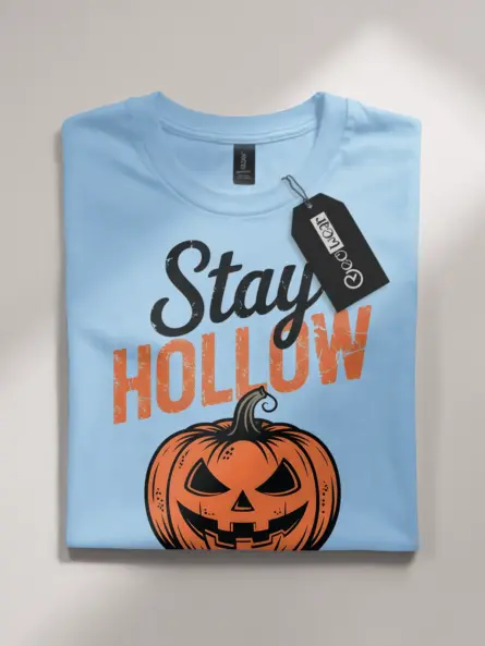 light blue flatlay front – Stay Hollow pumpkin graphic on vintage Halloween t-shirt