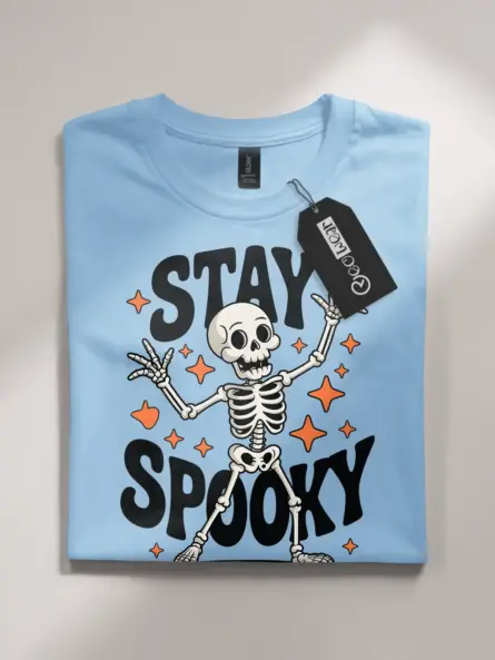 light blue flatlay front – vintage Stay Spooky dancing skeleton Halloween t-shirt
