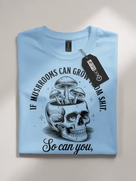 light blue flatlay front view if mushroom can grow funny mushroom skull shirt