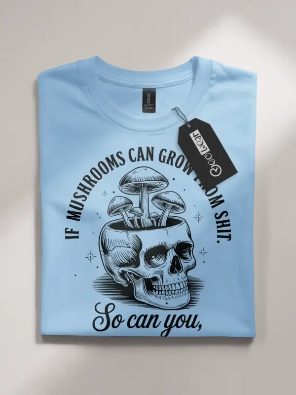 light blue flatlay front view if mushroom can grow funny mushroom skull shirt