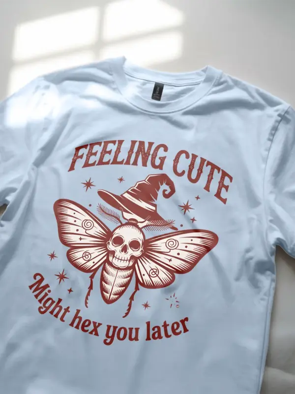 vintage moth skull print on light blue shirt