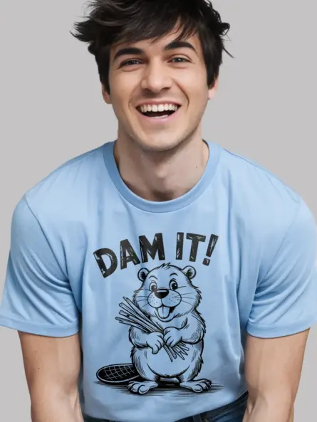 light blue shirt front with beaver illustration and dam it joke