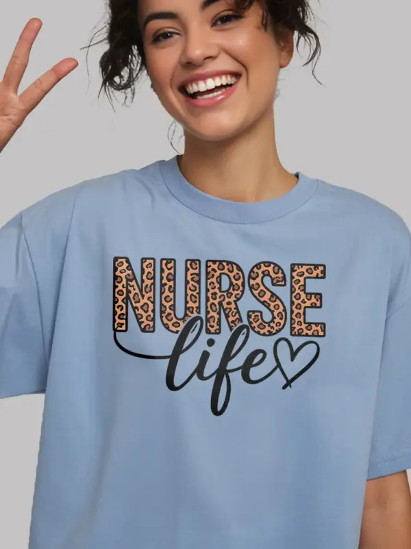 Front view of light blue leopard print nurse life t-shirt with heart