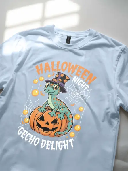 light blue lifestyle shot - whimsical gecko and pumpkin - gecko halloween t-shirt