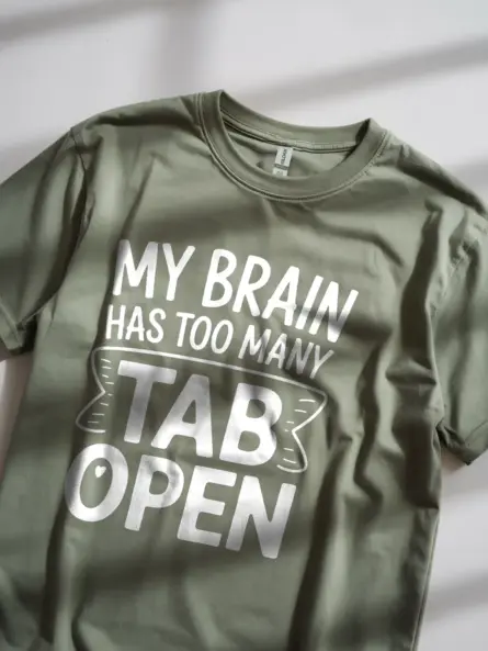 Lifestyle image wearing royal blue my brain has too many tabs open t-shirt