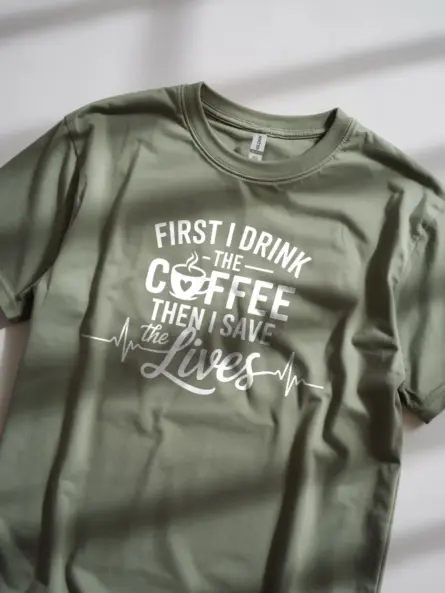 Military green first i drink the coffee then i save lives shirt lifestyle shot