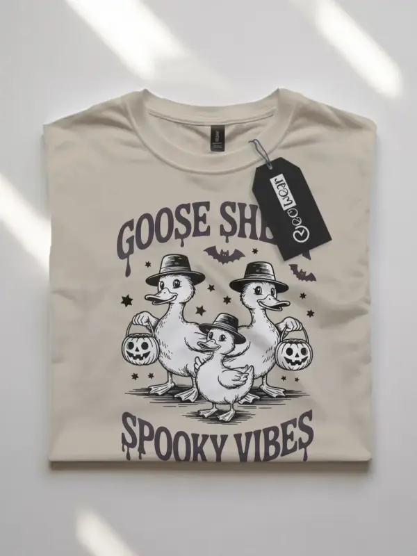 front –natural flatlay funny goose Halloween shirt with spooky duck design