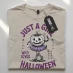 natural flatlay front – whimsical jack-o’-lantern design cute pumpkin girl Halloween t-shirt