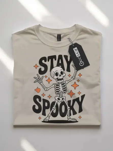 natural flatlay front – whimsical dancing skeleton Halloween t-shirt