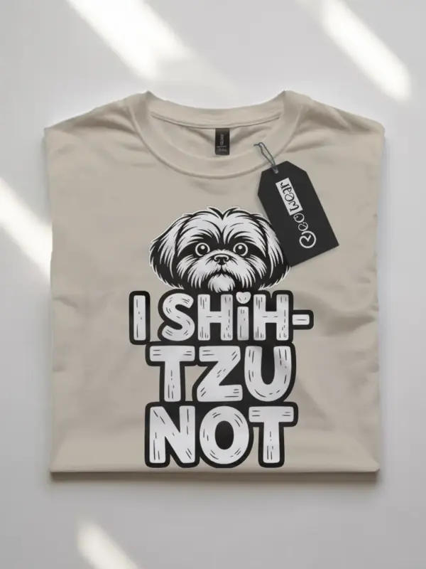 natural flatlay folded – Shih Tzu pun tee folded view with cartoon dog