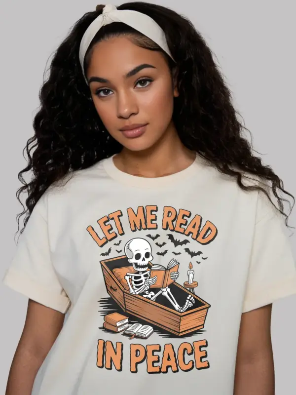natural shirt – spooky candle and books design – skeleton reading t-shirt