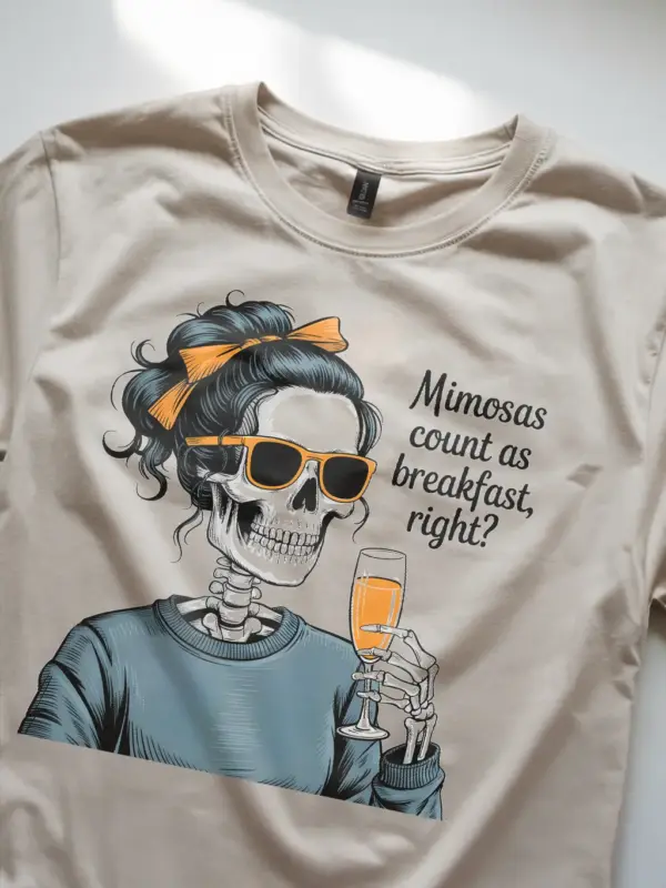 natural relaxed woman wearing navy mimosa brunch skeleton t-shirt at cafe